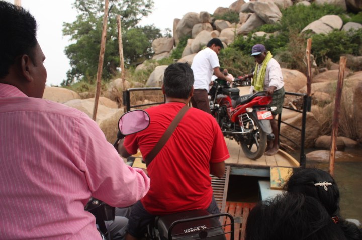 Taking our moped across on the ferry... when in Anegudi, do as...